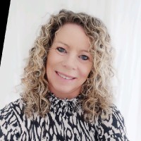 Corinne L.