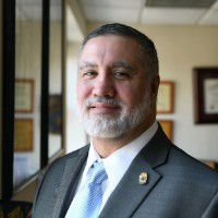 Mark A. Torres, Esq.