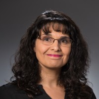 Zelie Bries, Mba