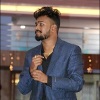 Nithil E