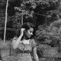 Anjali R