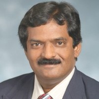 Dr Varghese George