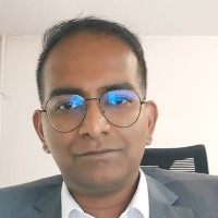 Naveen K.