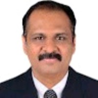 Dr. Arun B Mathews