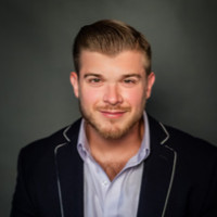 Adam T Cummings