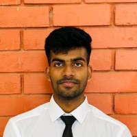 Amrit R