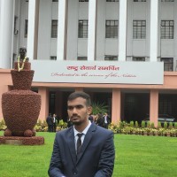 Nikhil M