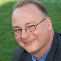 Mark A. Delos