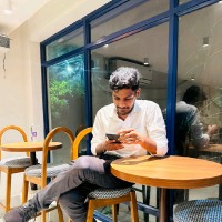 Dhanesh B
