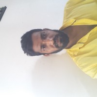 Aruna M