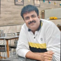 Vinod B