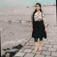 Nisha M