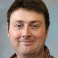 Tom C Cameron