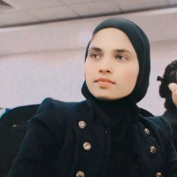 Nazima K