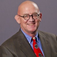 John B.