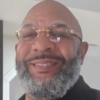 Keith Enos  M.L.S. -International Business Law