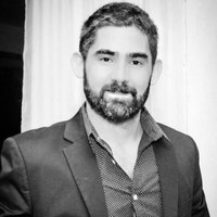 MIGUEL DELLANA