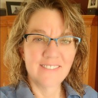 Liz Long, Mpa