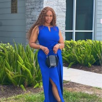 Ashley Holmes, Mba