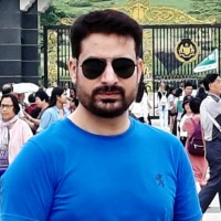 Ajay B.