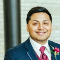 Luis E.