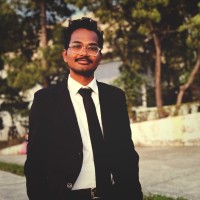V. MANI