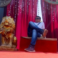 Dinesh B.
