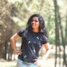 Nisha M