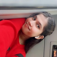 Sandhya B.