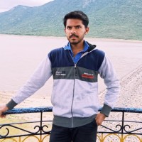 Madan K M