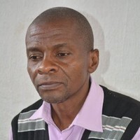 CHRISTOPHER KIMARO