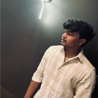 Suraj A