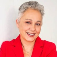 Theresa Pinto, Iom