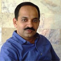 K M Adhikari