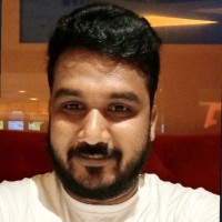 Ezhil B