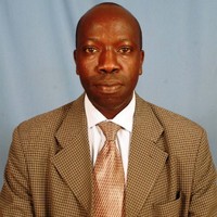 Dr. John Tarus