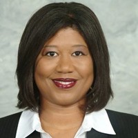 Dr. Tajuan Woody-Mahatoo