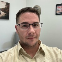 Travis May