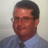 Guy Travis, MHA
