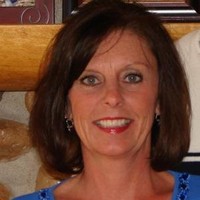 Carol May