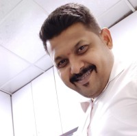 Dinesh M