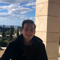 Dionysis Mouzakis (He/Him)