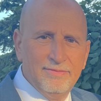 Lou Tassone, Cem