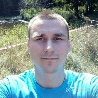 Руслан Окопний