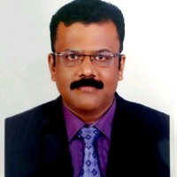 John Thomas, M Com, CII