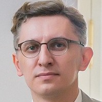 Михаил Евстигнеев