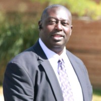 Ernest Benjamin, MBA.