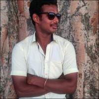 Dhakshinamoorthi K