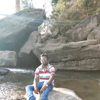 Suraj T