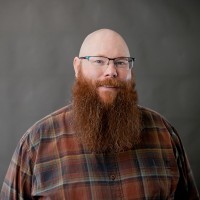 Greg K.